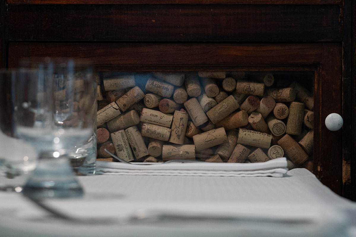 O Palmeiral terrace set for a private drinks reception — evening light, cocktails on the bar, Travessa de São José, Príncipe Real